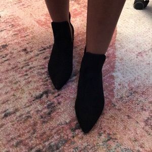 Black suede kitten heel booties.